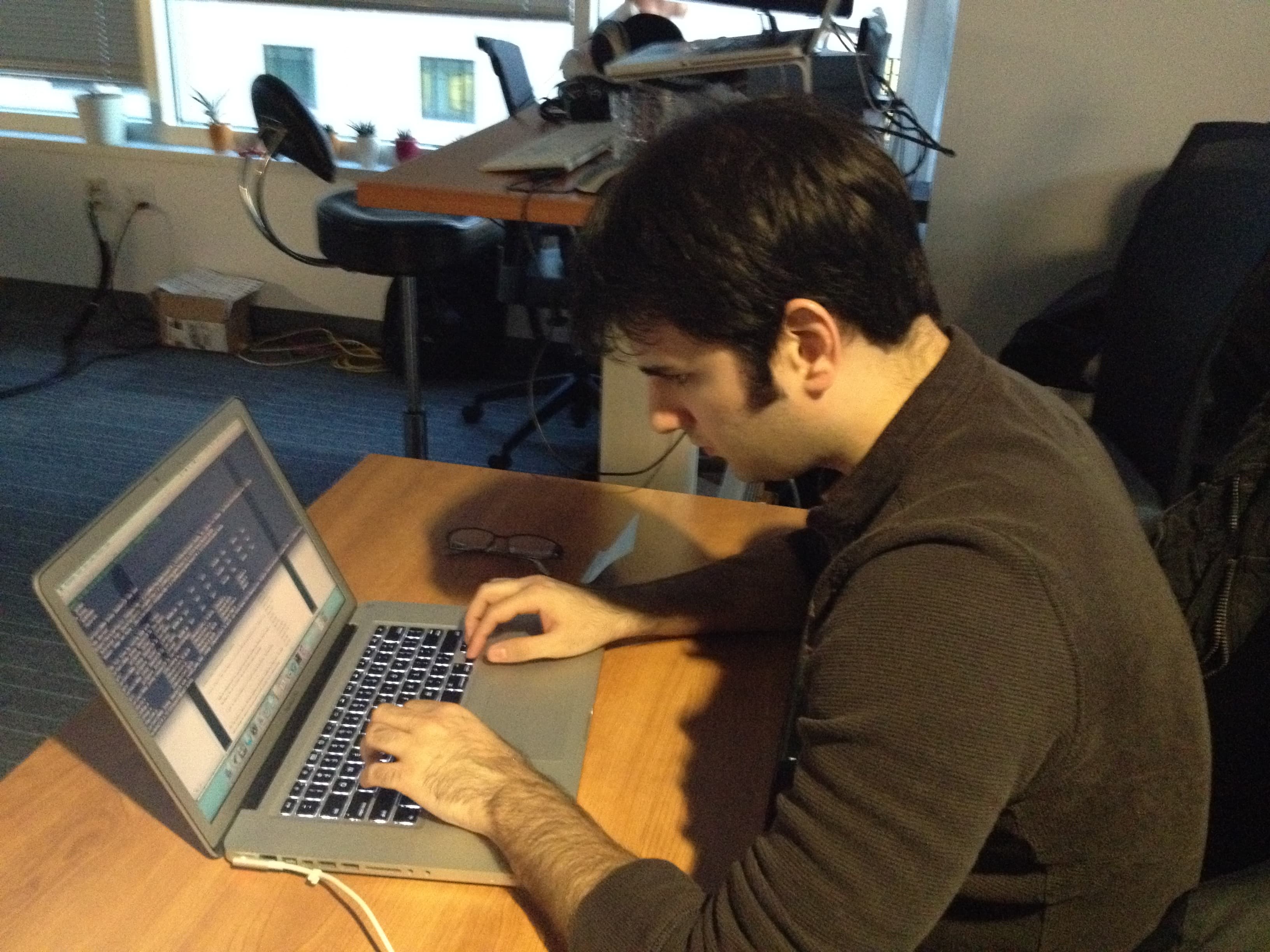 Photo from Opower: Carlos working diligently