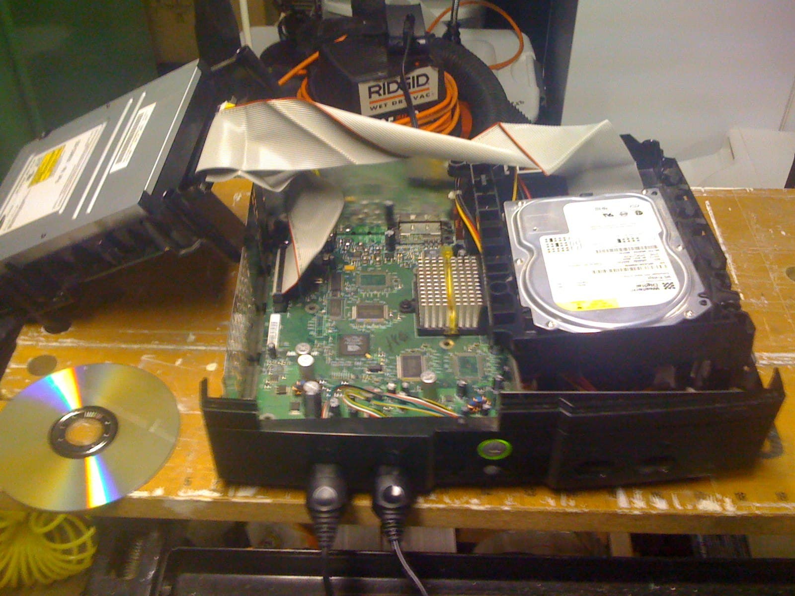 Photo from Xbox Linux: we popped it open and it looked hard